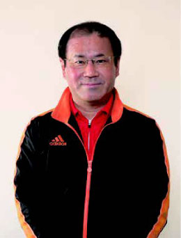 京都RADISH HOUSE 理事 江本謙次氏写真（ジャージ姿で笑顔）